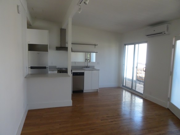 After Renovation Second Floor Unit with Wood ceilings and floors