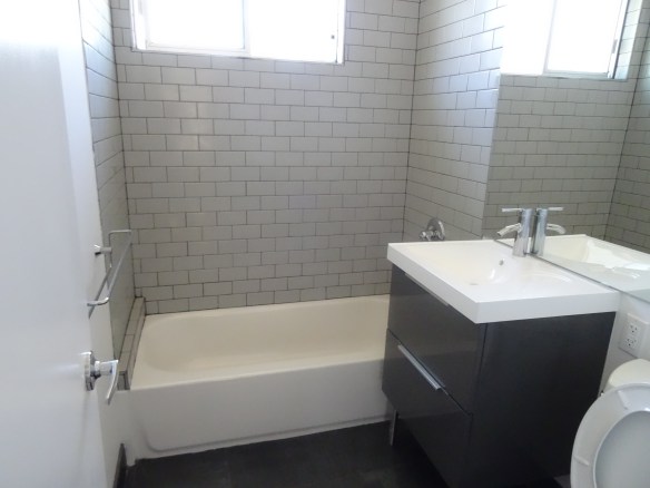 After Renovation Bathroom with subway tiles and new vanity