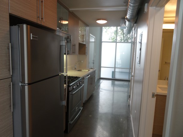 Kitchen in the hallway at Luxe on 4th Street, Santa Monica